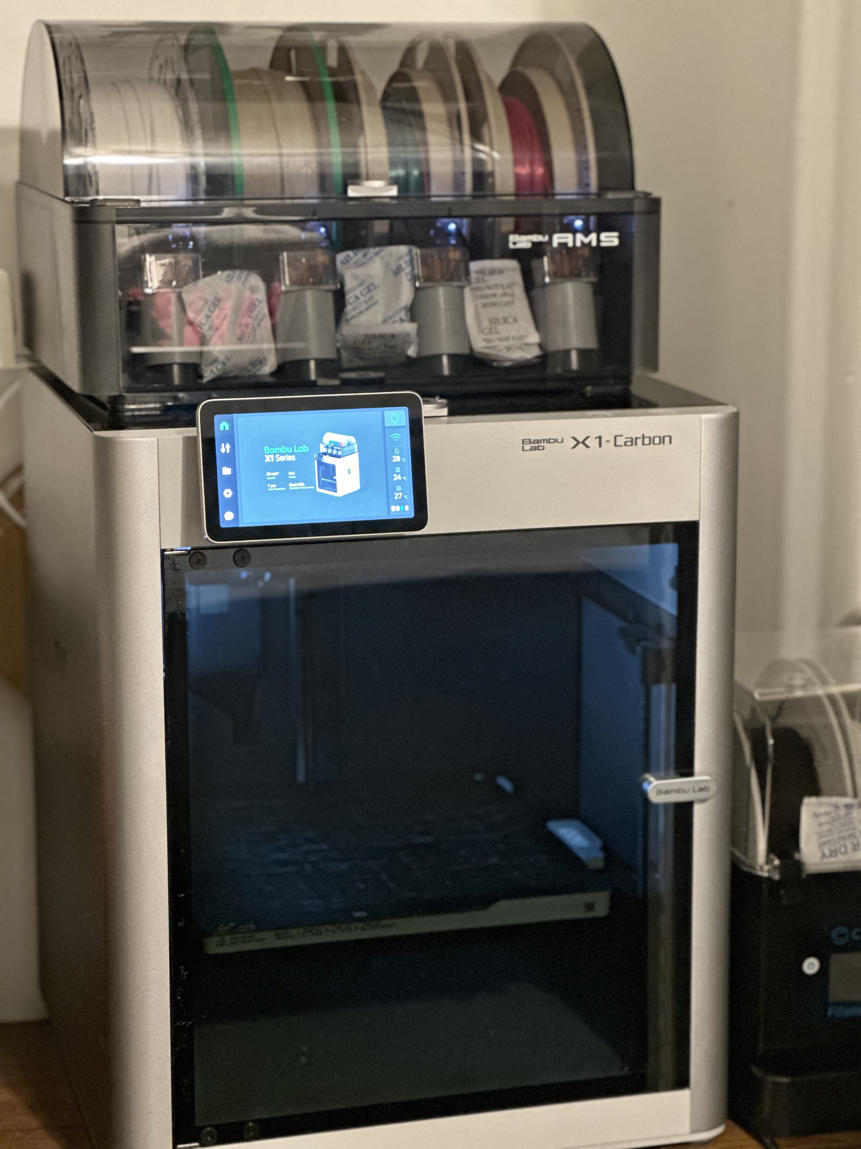 In this photo you can see available are 4 options via ams and 2 external options in a filament dryer.